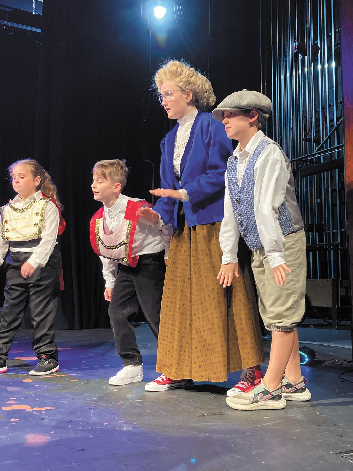 PRACTICE MAKES PERFECT: “The Music Man Jr.” cast practices for their upcoming performance. The group consists of 30 kids ages seven to 16. This summer alone, Rhode Island Youth Theatre has had 250 campers in their programs.